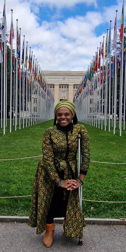 Picture of Catherine Musola in front of UN Geneva building