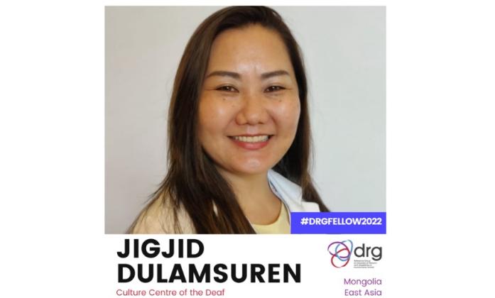 Banner with a profile picture of Duya on the top. A logo of the DRG is on the right with the hashtag #DRGFELLOW2022. Then a text reads Jigjid Dulamsuren, Culture Centre of the Deaf, Mongolia. East Asia.