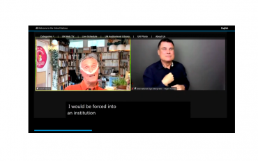 Screen shot of webinar with Adolf Ratzka speaking using a breathing tube, with CART and an international sign interpreter.