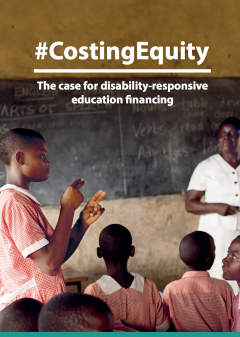 Costing Equity report cover. A young boy stands in a classroom signing. 